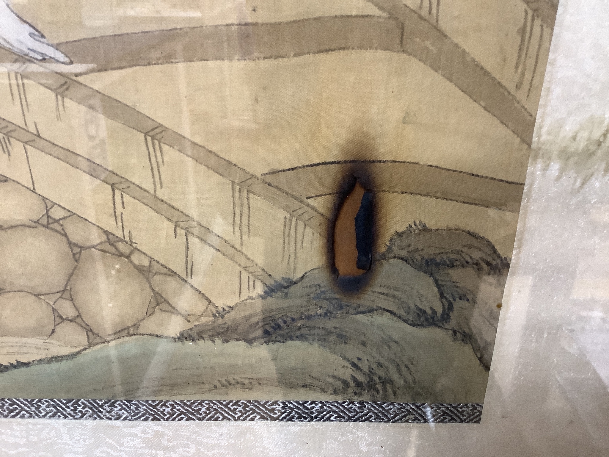 A large Chinese watercolour on silk, late 19th/early 20th century, woman in a landscape, signed, 91 x 42cm.